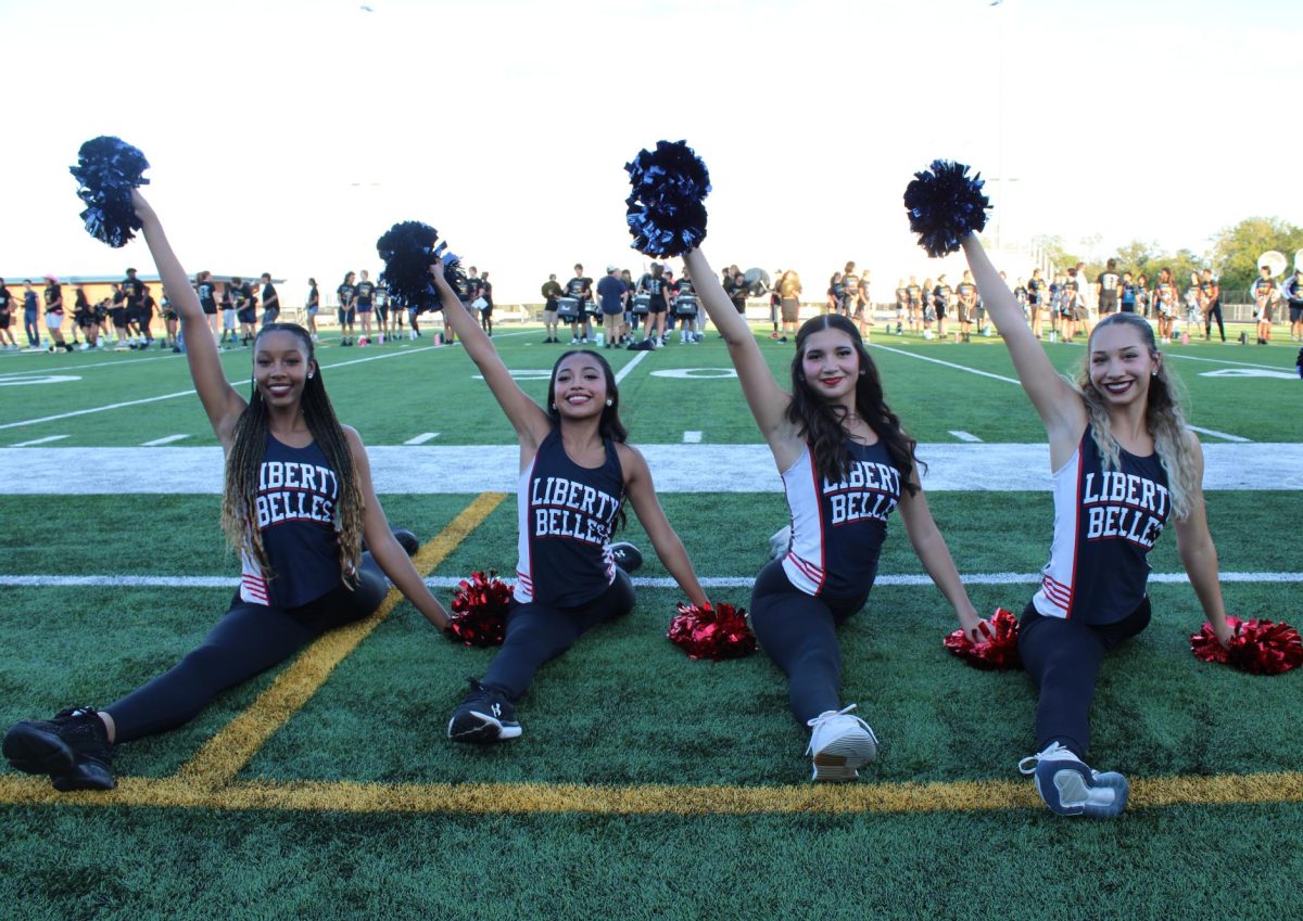 (Left to right) Seniors Jada Lewis, Sofia Perez, Aliyah Gonzalez and Jerissa Tucker showcase their patriot pride in a skillful sync.