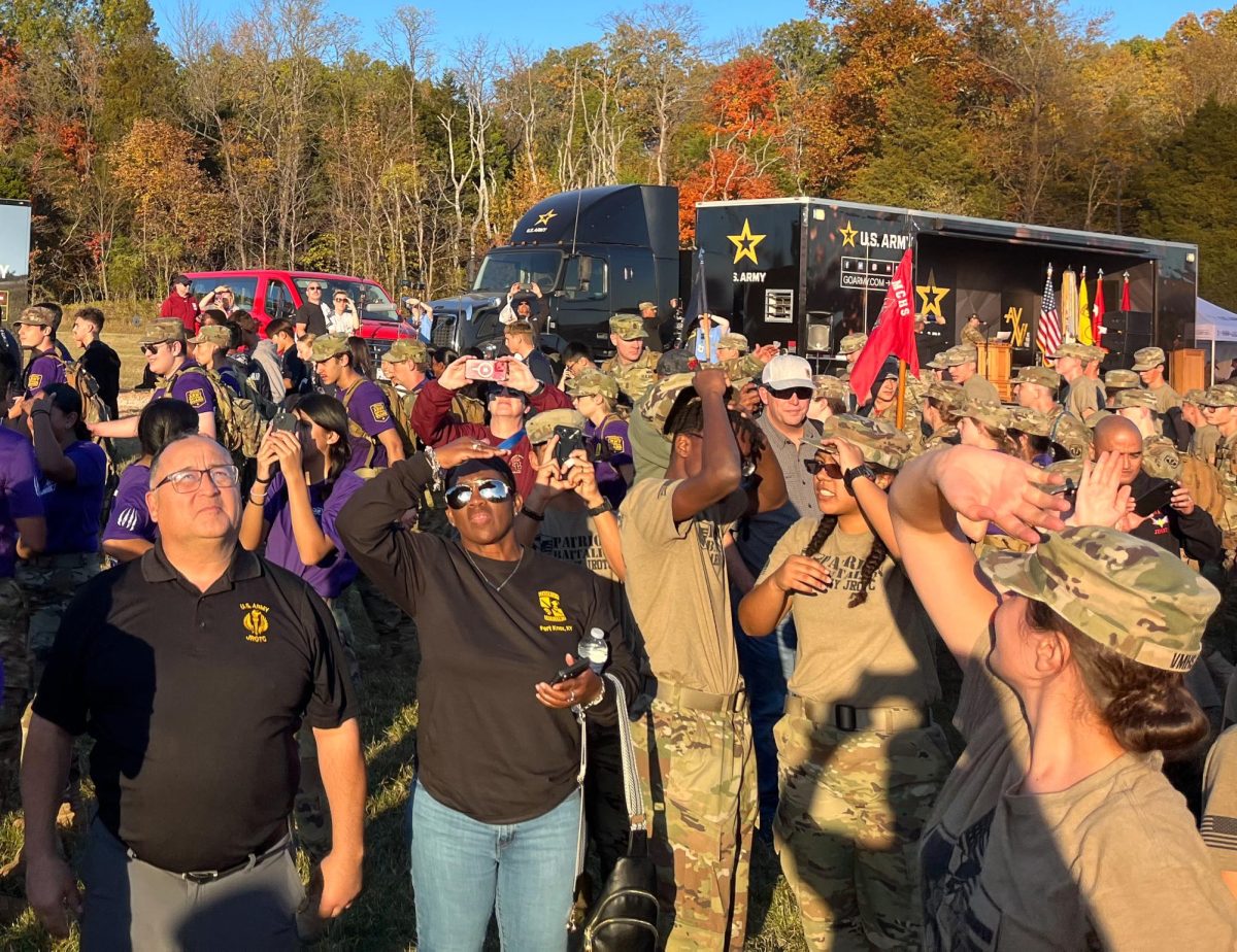 Maj. (R) Lawrence Garcia (Left) and Sgt. 1st Class (R) Karen Hudson (Middle) supervising the Patriot Battalion at the opening ceremony.