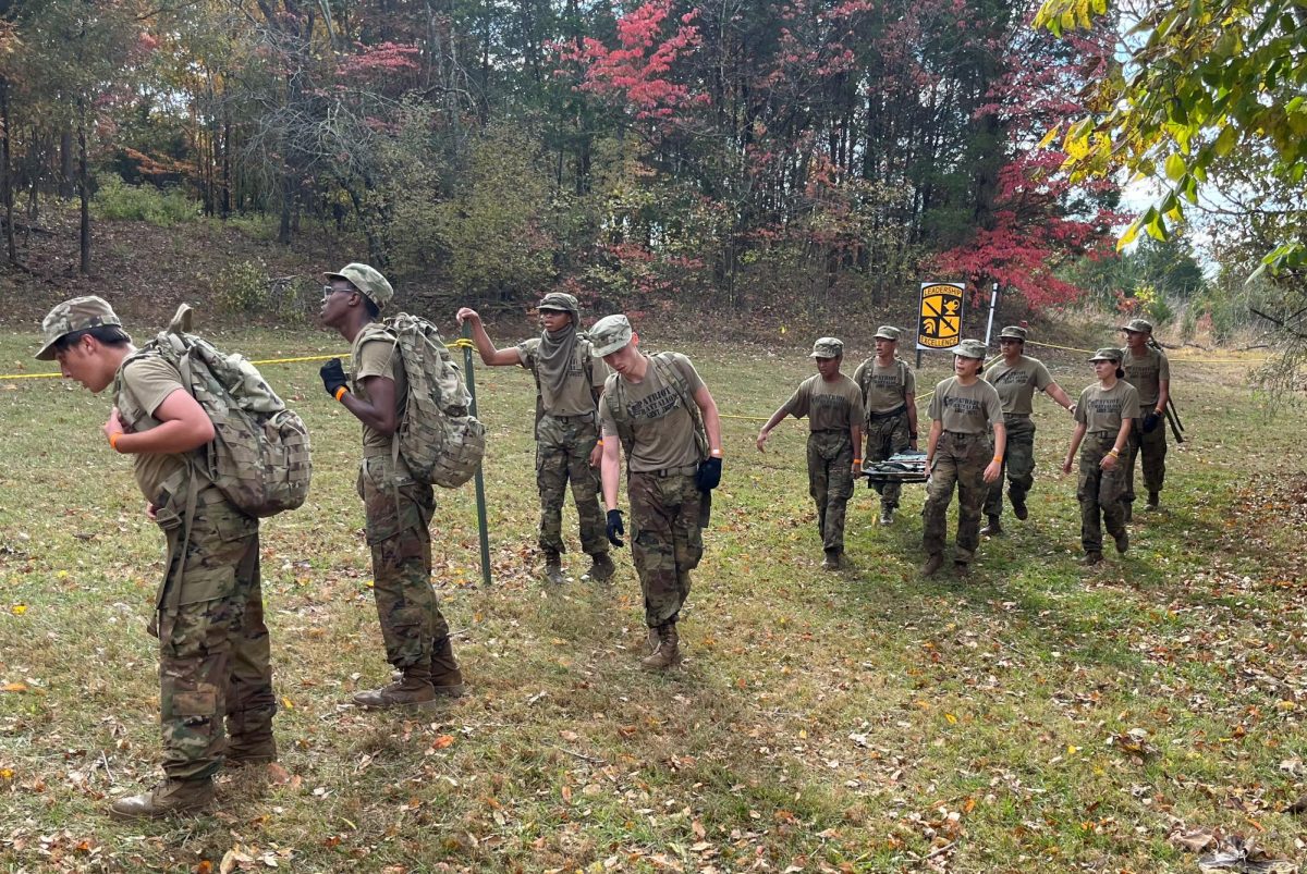 The Patriot Raider team approaching the tire swing obstacle on the cross-country rescue.