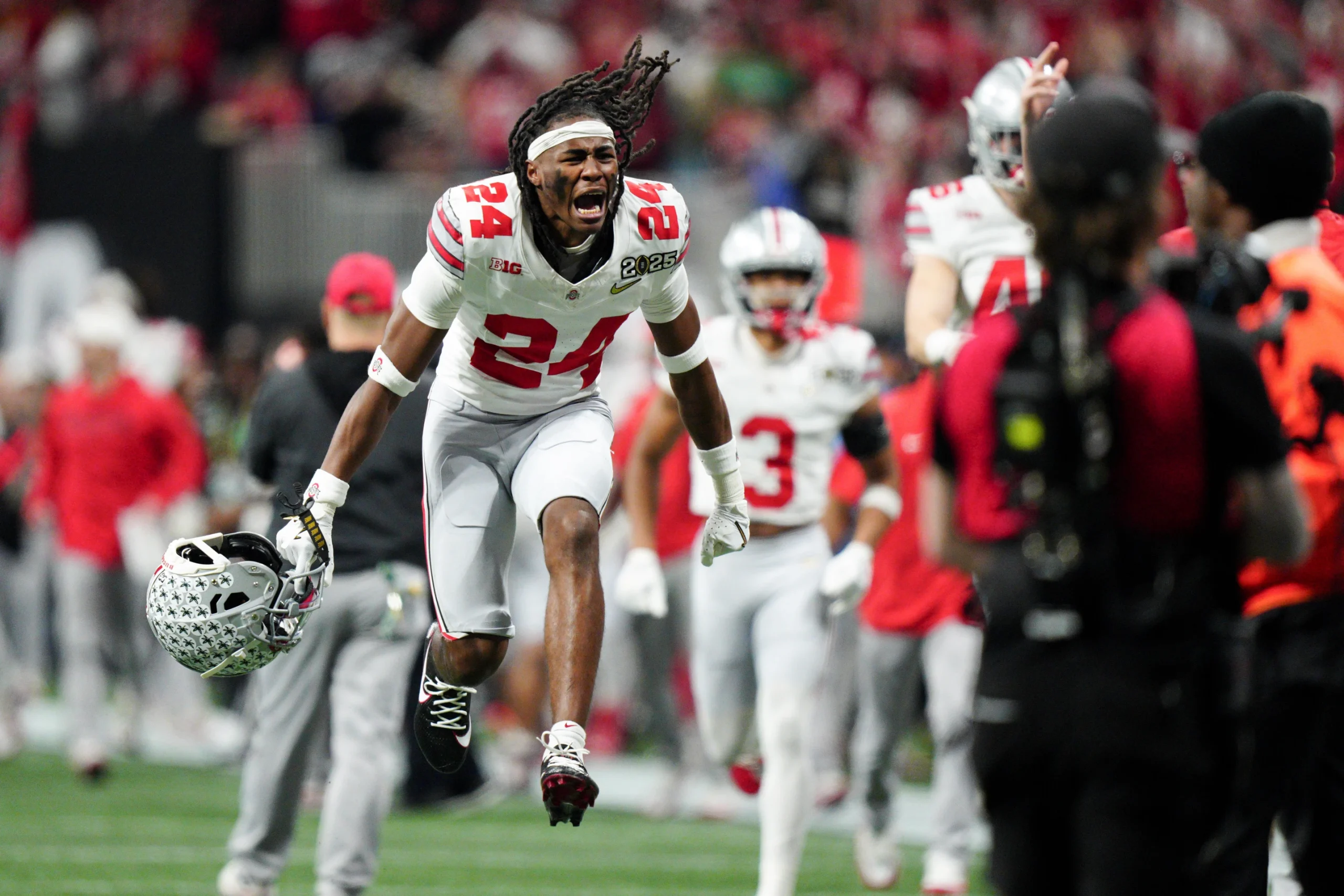 Ohio State cornerback Jermaine Mathews celebrates after the first half of the College Football Playoff national championship game against Notre Dame Monday, Jan. 20, 2025, in Atlanta. 